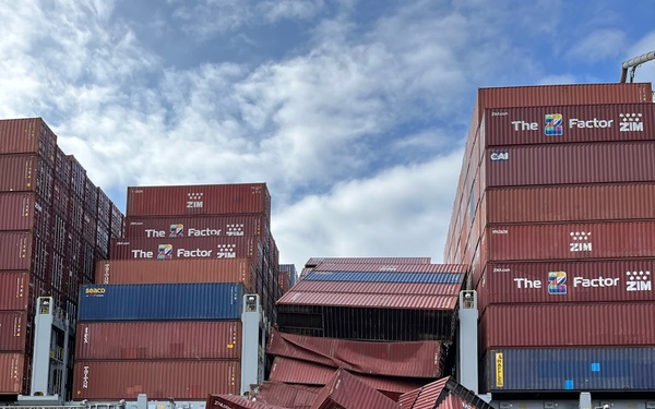 U.S Coast Guard Salvage Engineering Response Team surveys the container ship in the Port of Long Beach