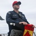 Sailors aboard the USS John Finn conduct flight quarters in the South China Sea