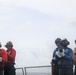 Sailors aboard the USS John Finn conduct flight quarters in the South China Sea