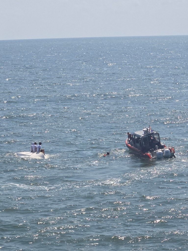 Coast Guard Air Station Houston Assists Capsized Vessel Boaters