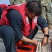 SR Freddy Climaco unfastens the pilot ladder to receive a small boat personnel transfer during NoCo25