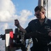 Sailors aboard the USS John Finn conduct an M240 gunshoot in the South China Sea