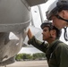 U.S. Marines with 1st Marine Aircraft Wing maintain helicopters