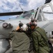 U.S. Marines with 1st Marine Aircraft Wing maintain helicopters