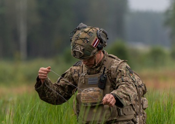 Latvian Explosive Ordnance Team Clears Trenches During Engineer Thunder 2025