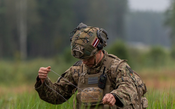 Latvian Explosive Ordnance Team Clears Trenches During Engineer Thunder 2025