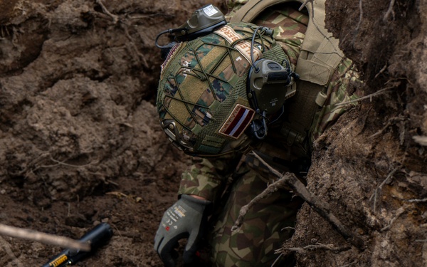 Latvian Explosive Ordnance Team Clears Trenches During Engineer Thunder 2025