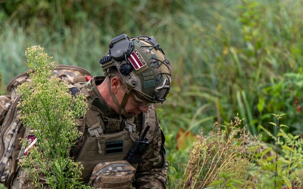 Latvian Explosive Ordnance Team Clears Trenches During Engineer Thunder 2025