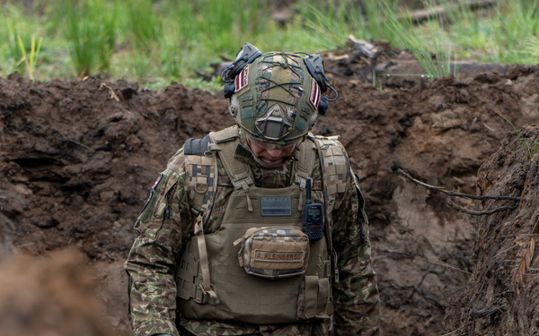 Latvian Explosive Ordnance Team Clears Trenches During Engineer Thunder 2025