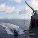 Sailors aboard the USS John Finn conduct a small boat operation during Maritime Cooperative Act in the South China Sea