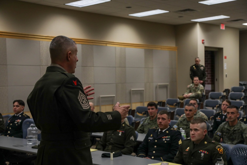 State Command Sgt. Maj. Christopher Casey gives welcome brief