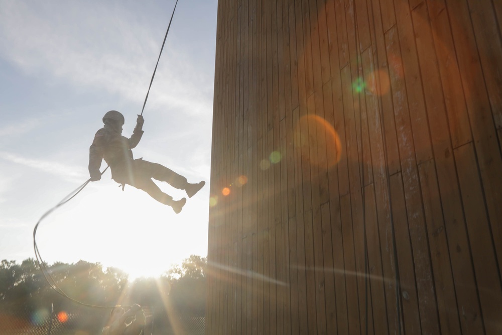 Soldier rappels down tower Soldier rappels down tower