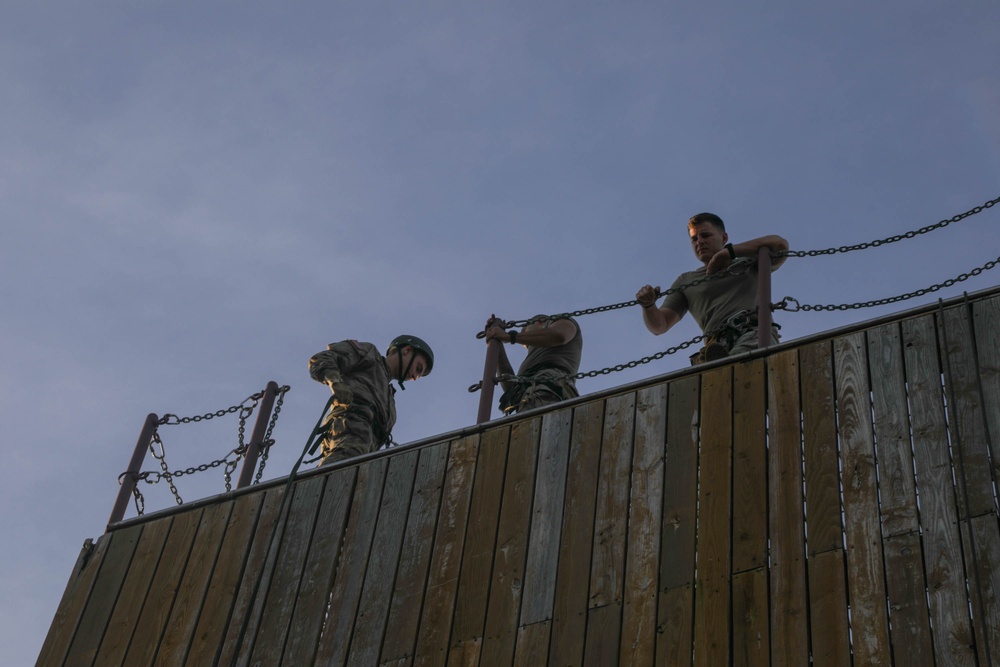 Soldiers prepare for the rappel tower