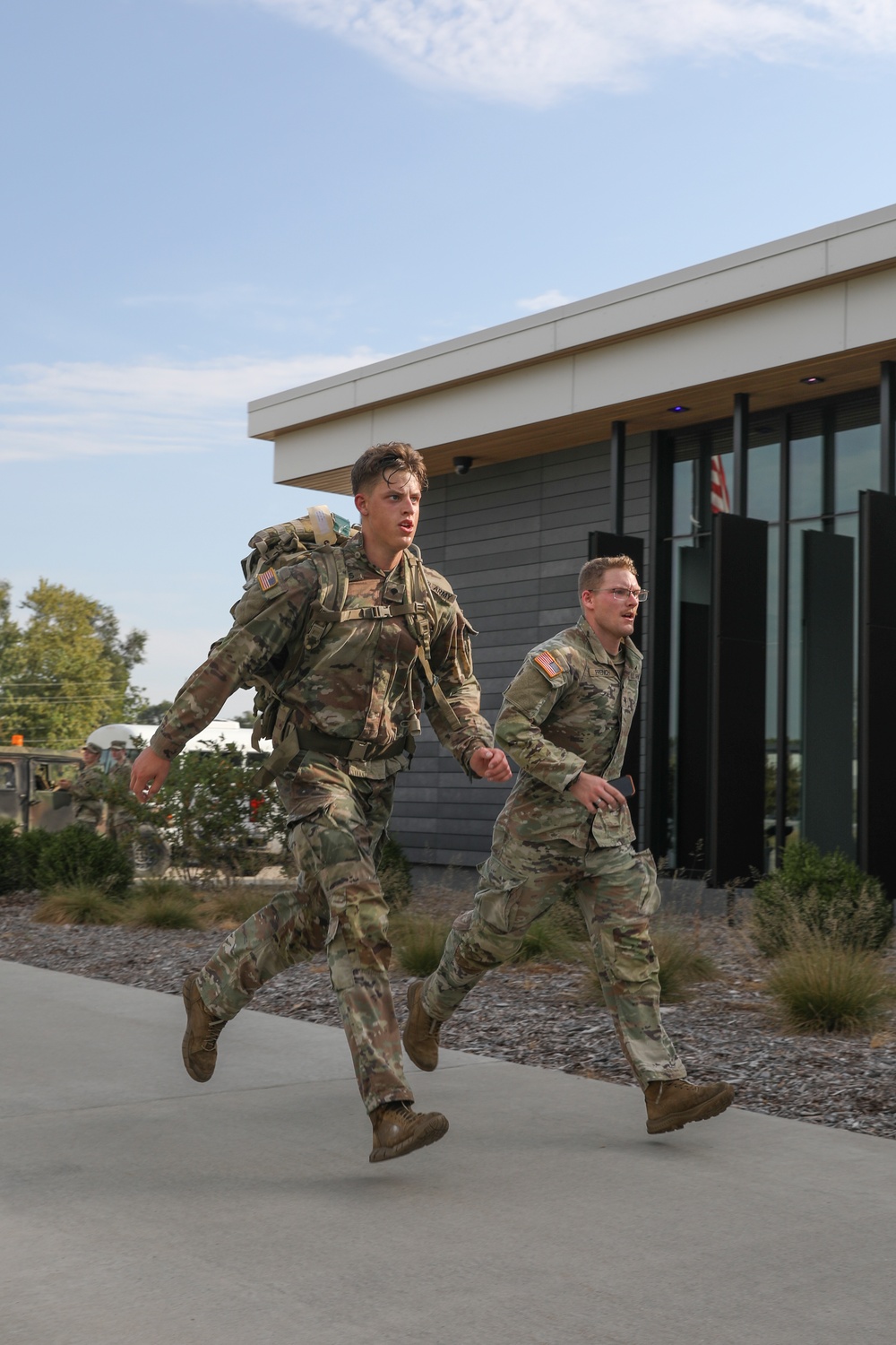 Spc. Eric Wichers crosses the finish line Spc. Eric Wichers crosses the finish line
