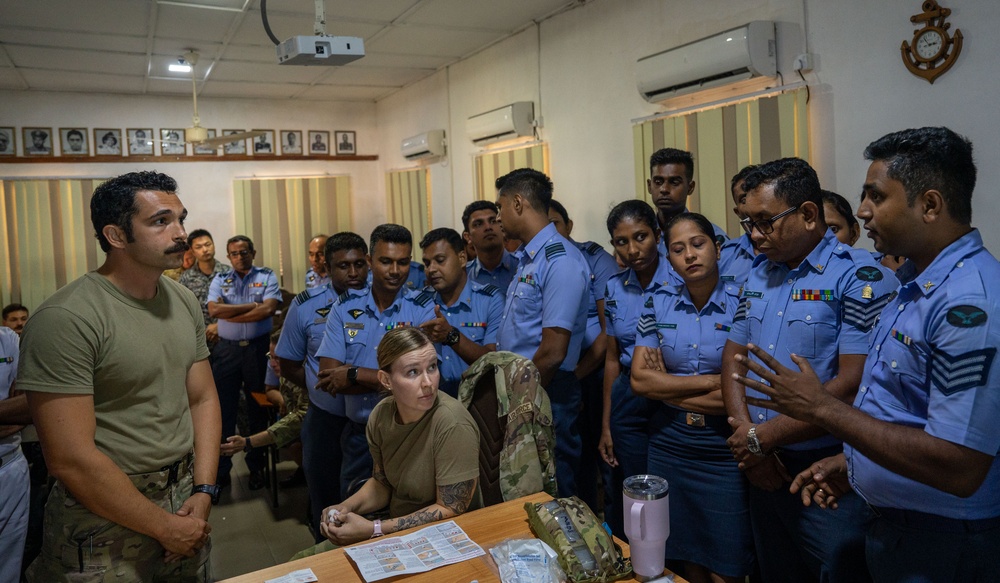 Air Force medical technicians brief Sri Lankan military doctors and public health officials during PAC Angel 25-1