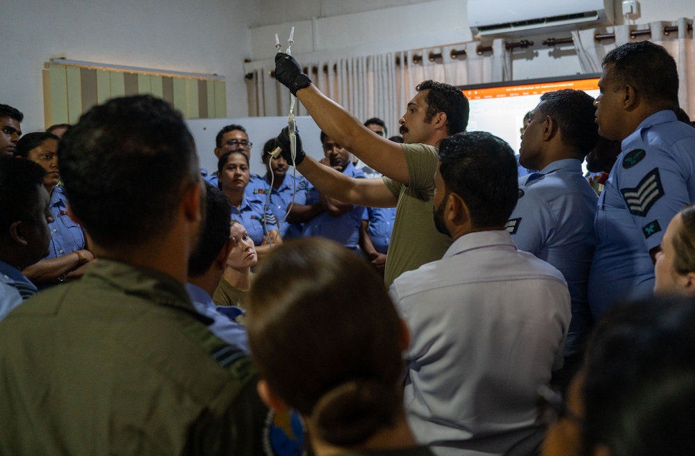 Air Force medical technicians brief Sri Lankan military doctors and public health officials during PAC Angel 25-1