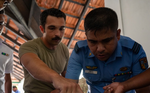 Air Force medical technicians brief Sri Lankan military doctors and public health officials during PAC Angel 25-1