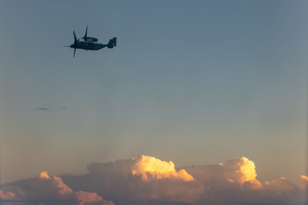 U.S. Marine MV-22B Ospreys refuel at night off the coast of Kagoshima, Japan