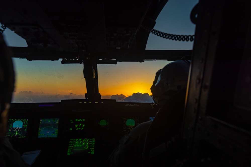 U.S. Marine MV-22B Ospreys refuel at night off the coast of Kagoshima, Japan