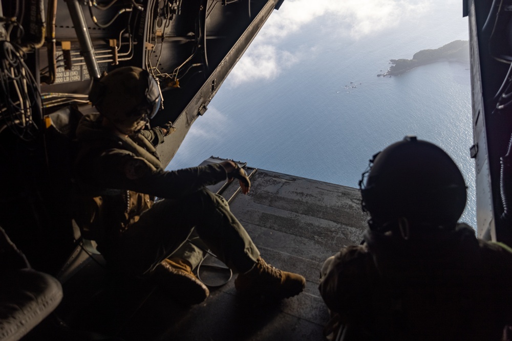 U.S. Marine MV-22B Ospreys refuel at night off the coast of Kagoshima, Japan