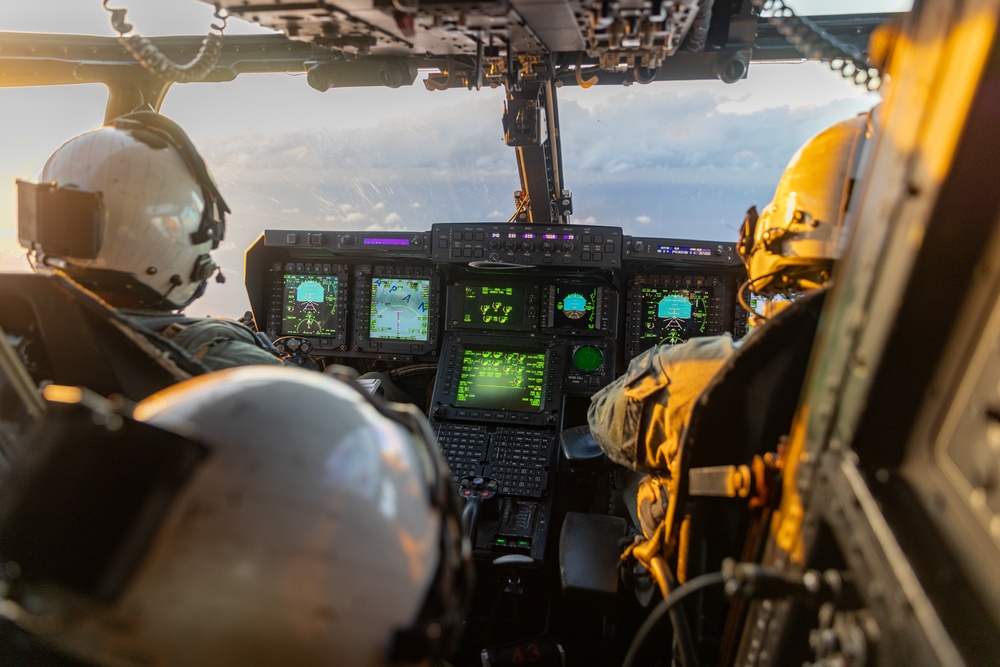 U.S. Marine MV-22B Ospreys refuel at night off the coast of Kagoshima, Japan