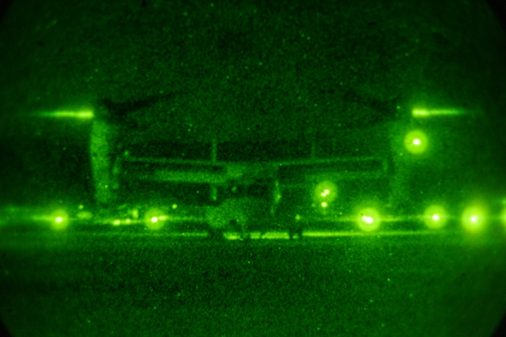 U.S. Marine MV-22B Ospreys refuel at night off the coast of Kagoshima, Japan