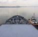 USS Frank Cable (AS 40) departs Singapore