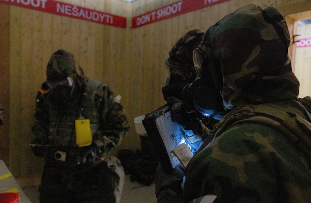 U.S. Army Soldiers map out locations of unknown substances in a hazardous site