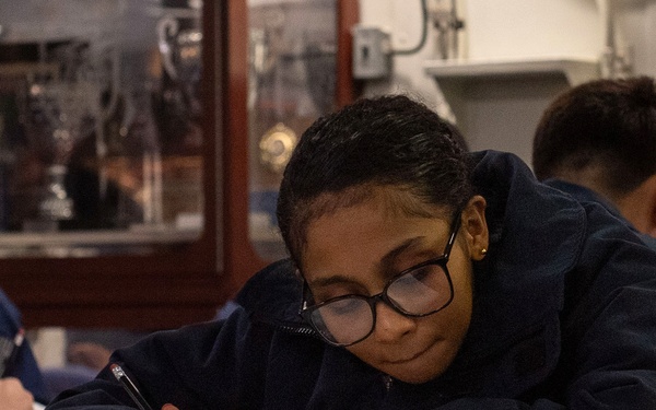 USS Essex Sailors take the E6 Navy wide advancement exam.