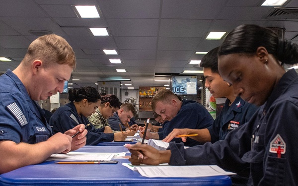 USS Essex Sailors take the E6 Navy wide advancement exam.
