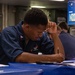USS Essex Sailors take the E6 Navy wide advancement exam.