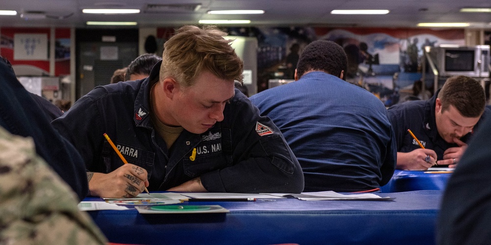 USS Essex Sailors take the E6 Navy wide advancement exam. USS Essex Sailors take the E6 Navy wide advancement exam.