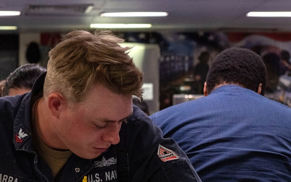 USS Essex Sailors take the E6 Navy wide advancement exam.