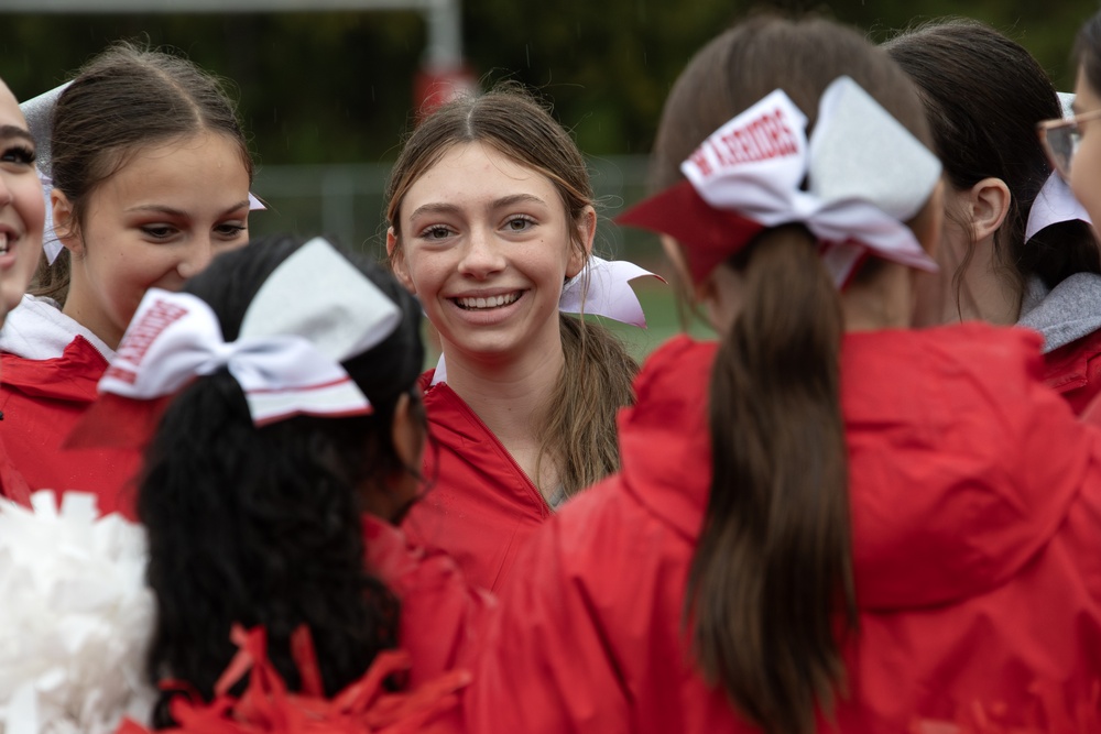 Alaska Army National Guard helicopter aviators conduct flyover for Wasilla High School football game