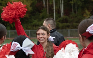 Alaska Army National Guard helicopter aviators conduct flyover for Wasilla High School football game