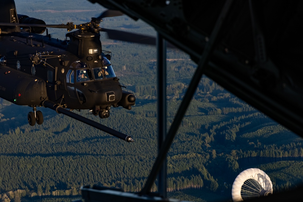Marines with VMGR 152 refuel Army helicopters during joint training