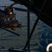 Marines with VMGR 152 refuel Army helicopters during joint training