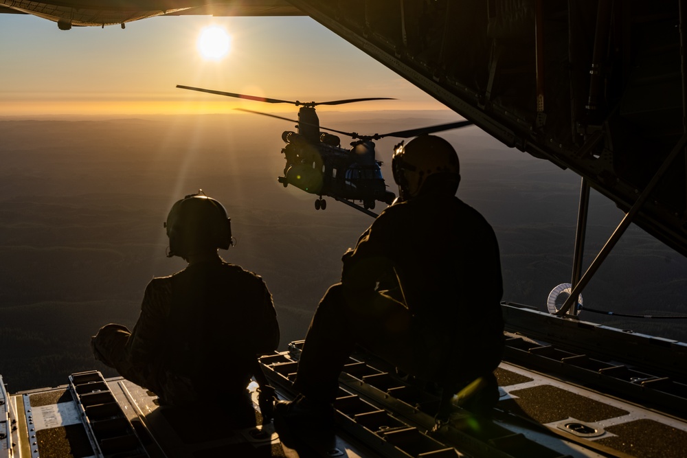 Marines with VMGR 152 refuel Army helicopters during joint training