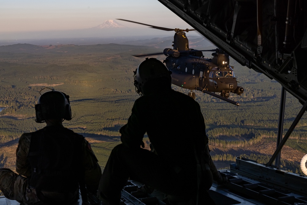 Marines with VMGR 152 refuel Army helicopters during joint training