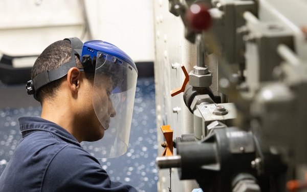 USS Curtis Wilbur (DDG 54) Sailor Conducts Maintenance