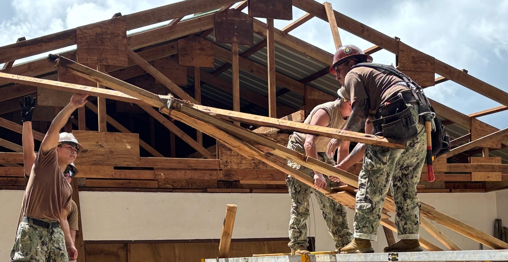 Seabees build roof for Kolonia Elementary School  in Pohnpei, Federated States of Micronesia, during Pacific Partnership 2025.
