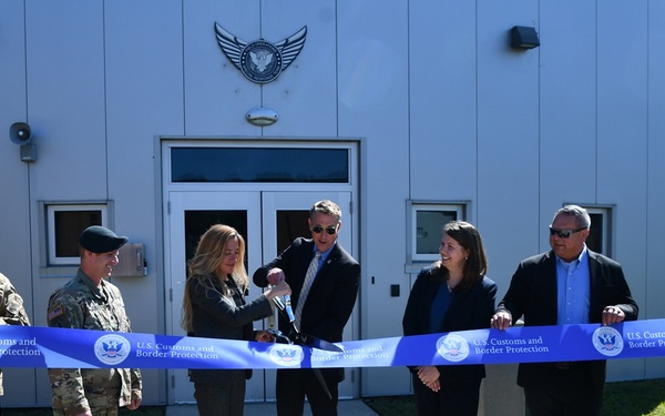 Customs and Border Protection Commissioner Rodney Scott and leaders cut the symbolic ribbon, officially opening the SRT training center on Fort A.P. Hill
