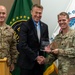 Customs and Border Protection Commissioner Rodney Scott presents a placard of appreciation to Lieutenant Colonel Matthew S. Bauer, commander of Fort A.P. Hill