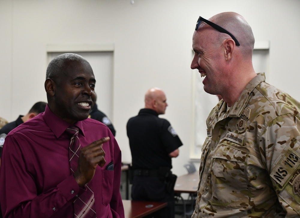 Fort A.P. Hill Director of Transformation Henry McNair shares a conversation with SRT Commander Kevin Green at the SRT ribbon cutting ceremony
