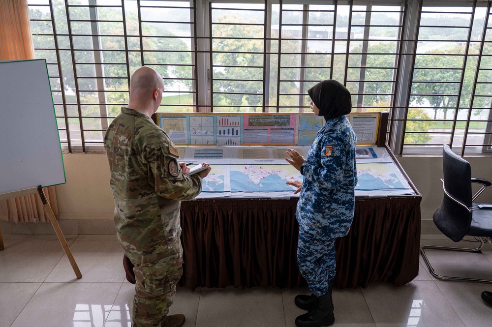 U.S. Air Force and Bangladesh Air Force discuss weather during subject matter expert exchange