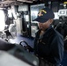 USS Curtis Wilbur (DDG 54) Sailor Mans The Helm