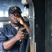 USS Curtis Wilbur (DDG 54) Sailor Conducts Boatswain's Pipe Call