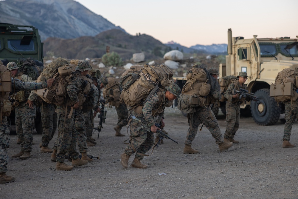 1st Bn., 5th Marines hike into training area during MTX 4-25