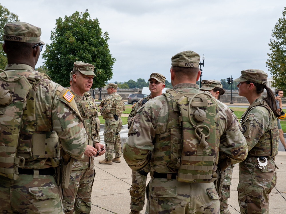 U.S. Army Maj. Gen. Thomas Friloux visits with Soldiers while they provide a presence patrol at the National Mall