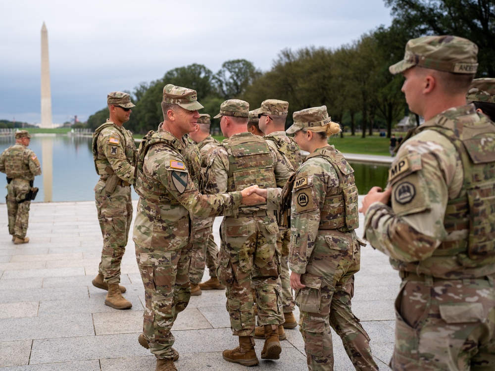 U.S. Army Maj. Gen. Thomas Friloux visits with Soldiers while they provide a presence patrol at the National Mall